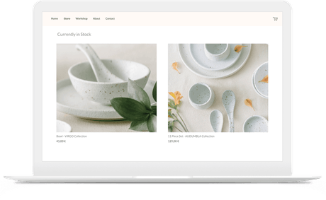 Online store built by artist selling pottery shown on a laptop.