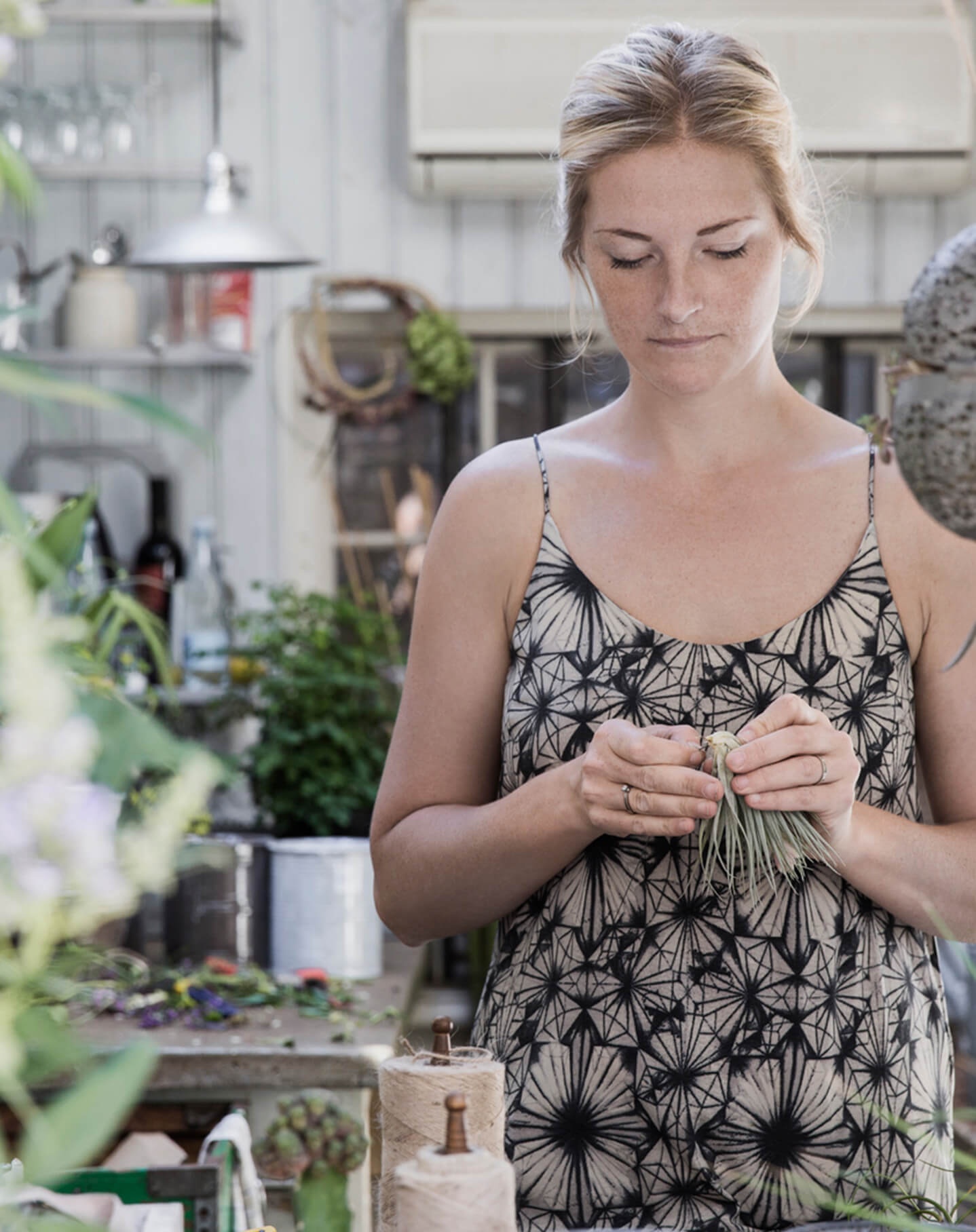 A woman in her studio plans her local business website